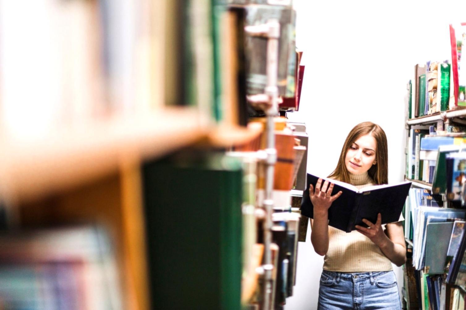 International students learning financial planning concepts in a modern classroom setting